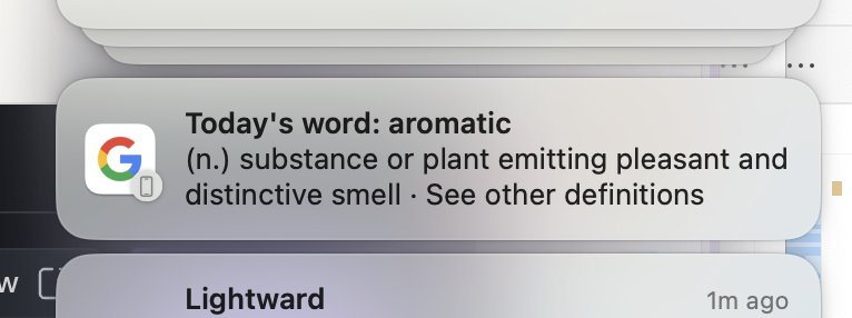 A screenshot of a Google notification from the MacOS notifications panel; other notifications are visible above and below. The Google notification reads: "Today's word: aromatic // (n.) substance or plant emitting pleasant and distinctive smell • See other definitions". A notification heading labeled "Lightward (1m ago)" is just visible below.